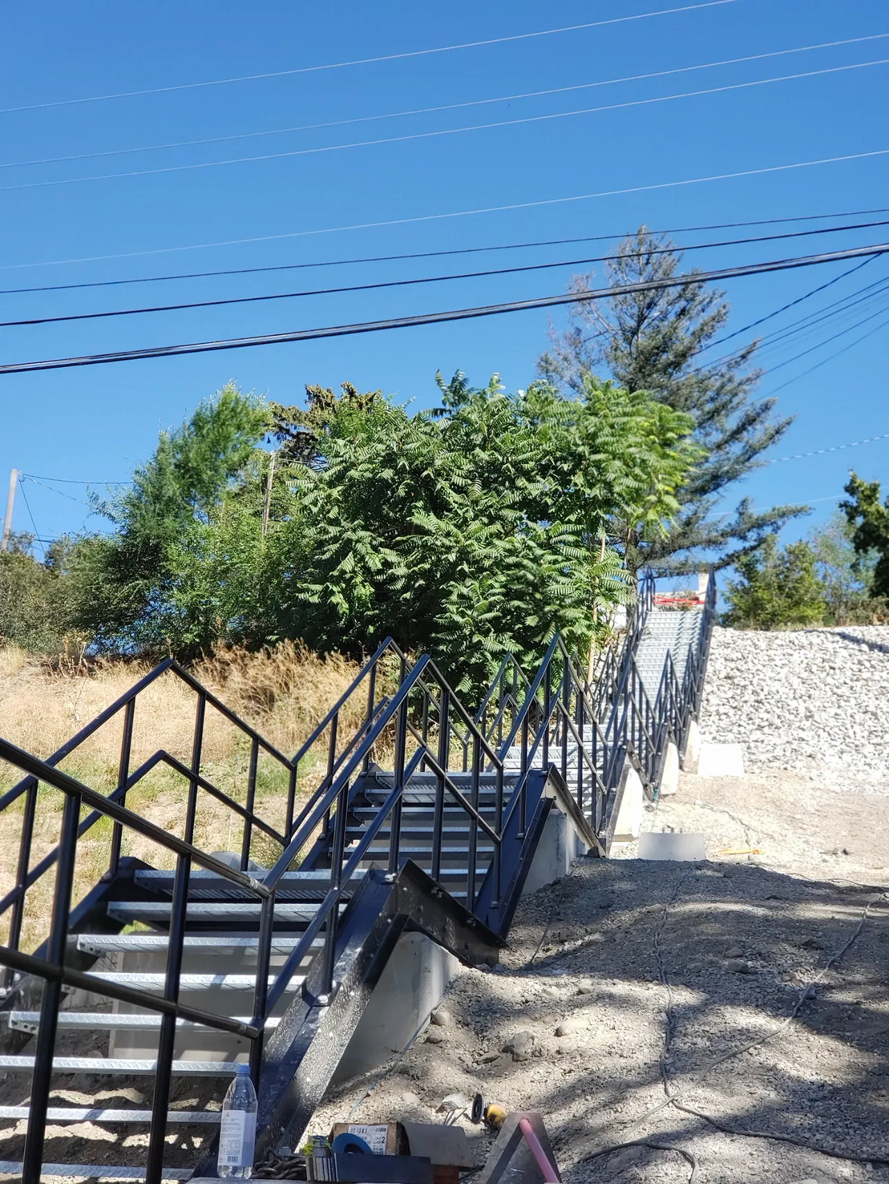 Structural steel stairs installation – High Street Ventures hillside span